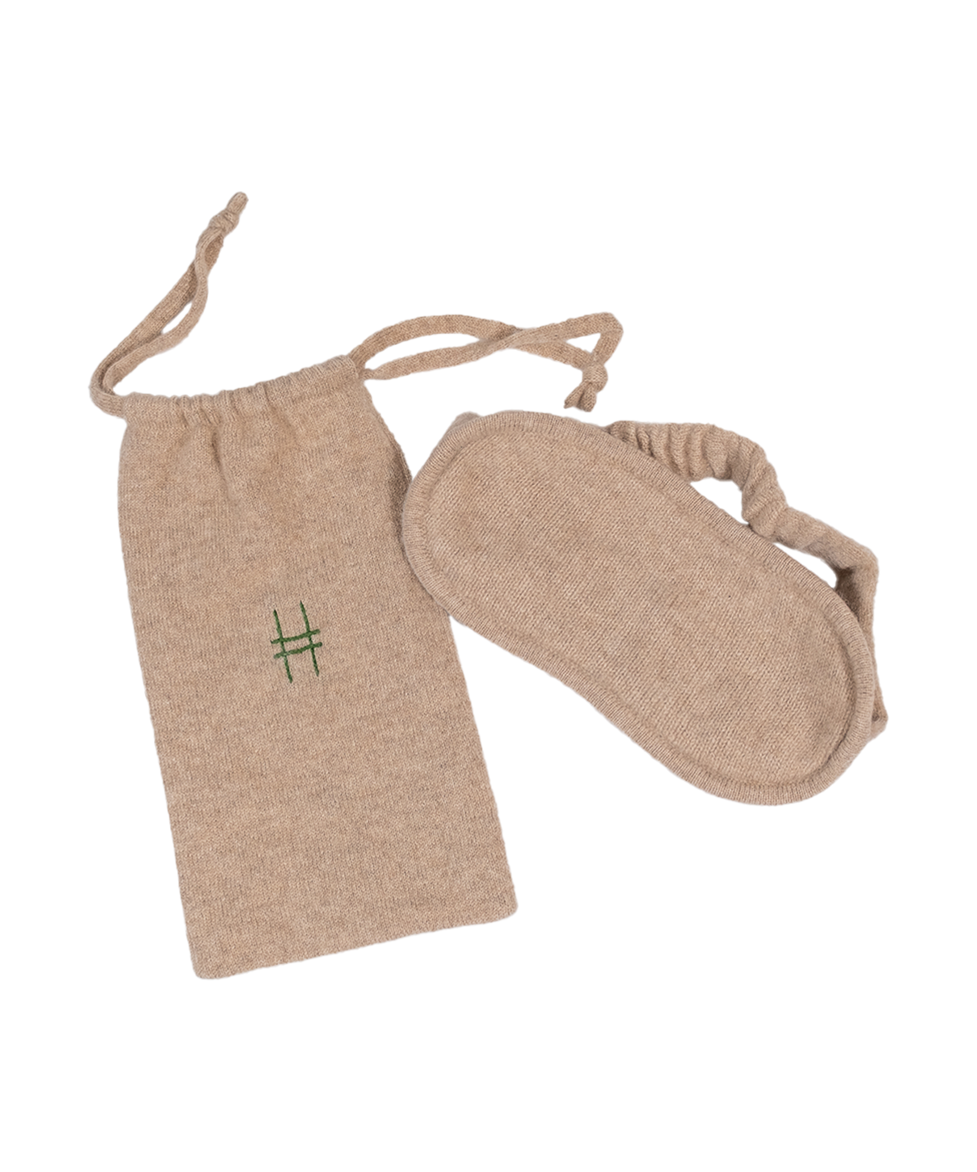 The Lingua Franca x High Line 100% Cashmere Eye Mask with travel case. This oatmeal-colored eye mask comes with a 100% cashmere travel bag embroidered with the High Line icon in green.
