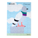 Jigsaw puzzle with a cartoon of the big pigeon statue against a blue sky, with the High Line wordmark, and Dinosaur creator Iván Argote's signature.