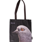Dinosaur Tote front, with big pigeon head, "Dinosaur" and artist Iván Argote's signature screen-printed on a black tote.