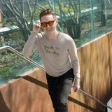 Man wearing the Lingua Franca x High Line Cashmere Sweater as he walks up the Gansevoort steps to the High Line.