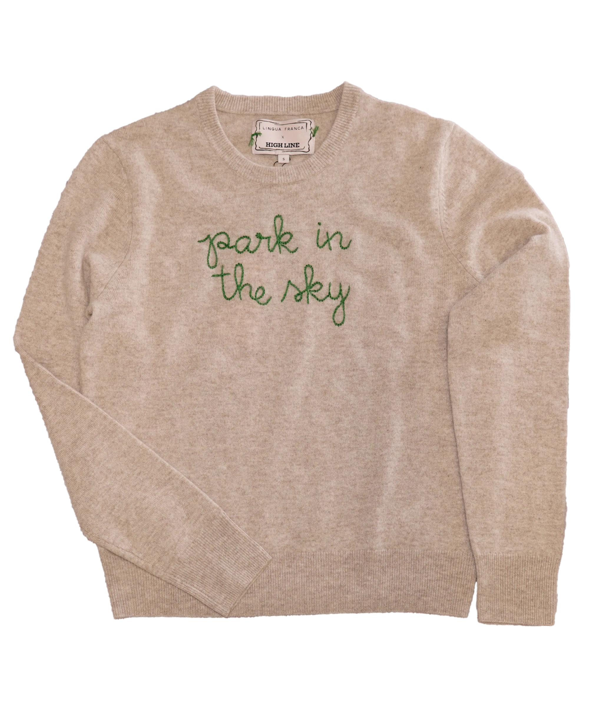The Lingua Franca x High Line 100% Cashmere sweater in an oatmeal color with "park in the sky" embroidered in script in green thread.