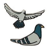 The Pigeon Pins—two enamel pigeon pins, one sitting and one in flight, illustrated by Jiaqi Wang.