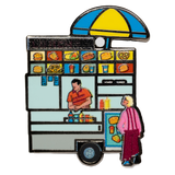 Street Vendor enamel pin—NYC corner food cart with customer deciding their order, as illustrated by Jiaqi Wang.