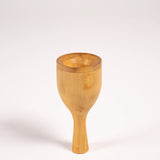 Robin bird call made from wood and metal against a white background.