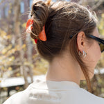 Closeup of the Big Icon Crewneck in River Birch with monochromatic "Park in the Sky" embroidered below the back collar.
