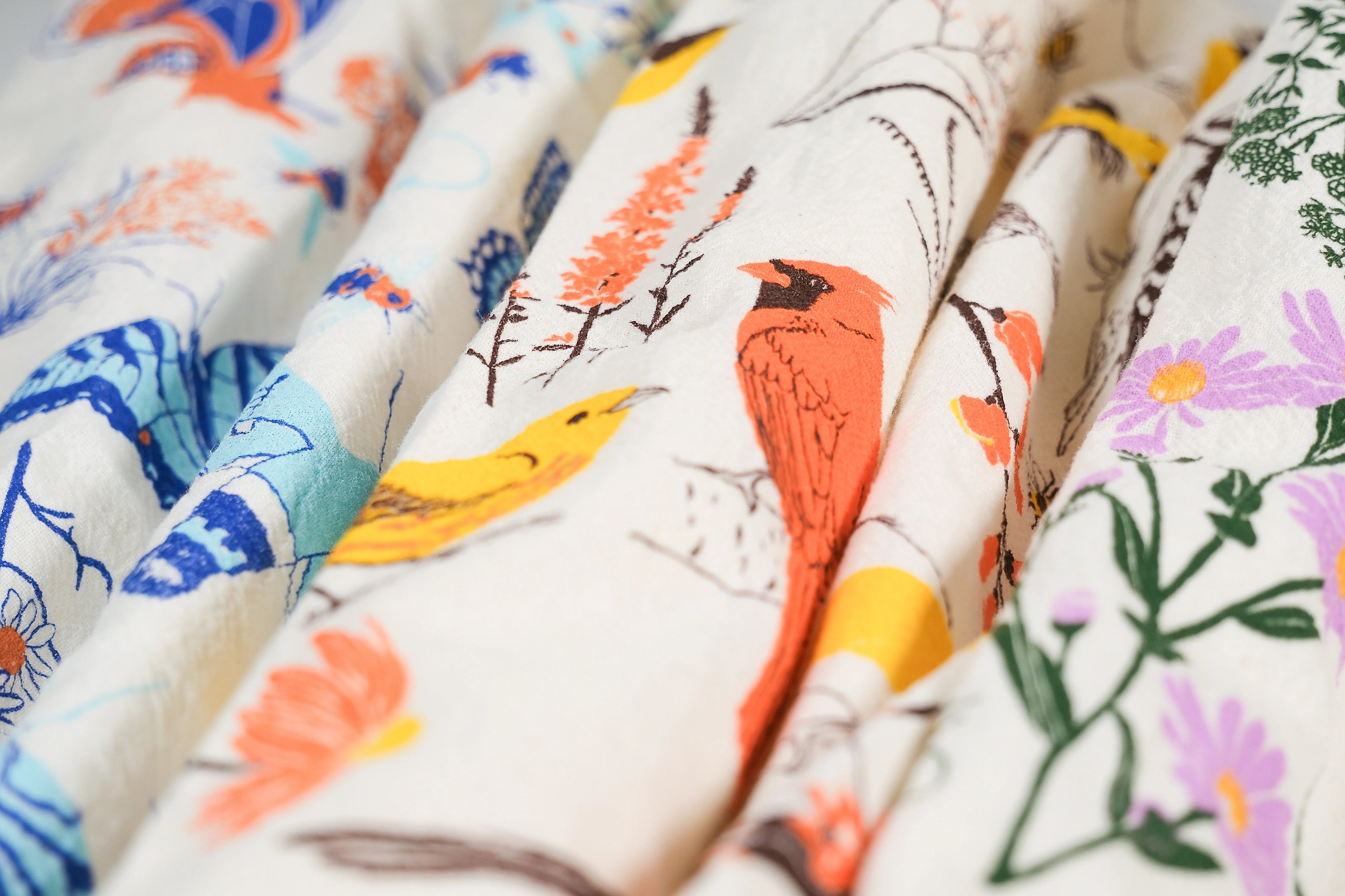 Closeup of the three tea towels in the Claudia Pearson x High Line collection.