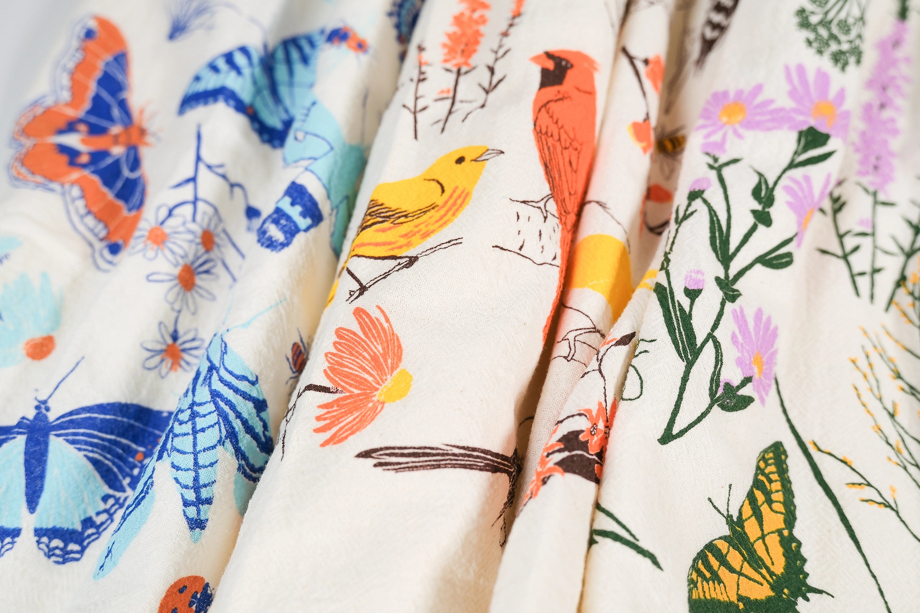 Closeup of the three tea towels in the Claudia Pearson x High Line collection.