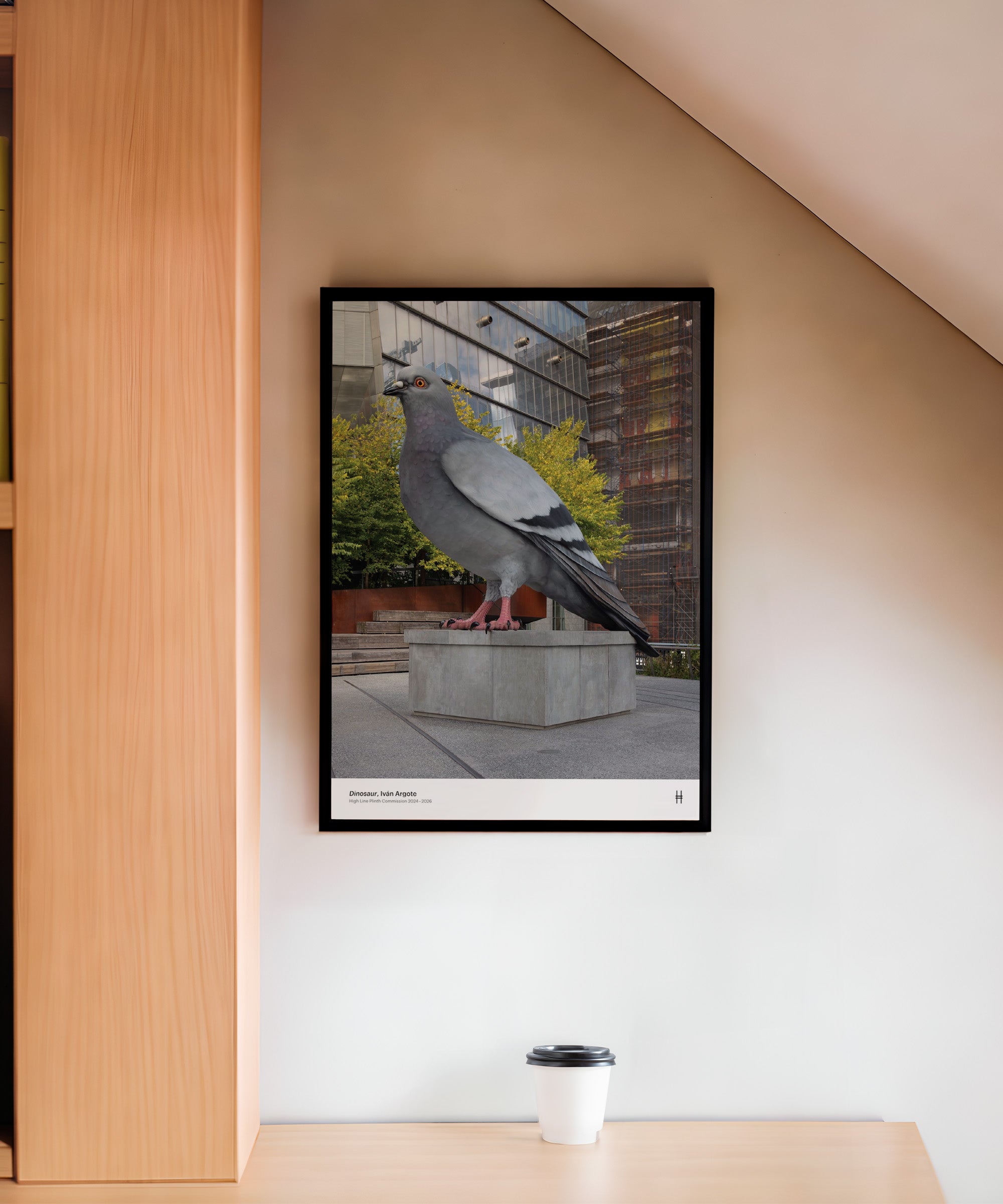 Dinosaur poster, featuring a photo of the 21-foot high Dinosaur statue aka the big pigeon, shown framed on a wall.
