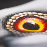 Closeup of the pigeon eye printed on the Dinosaur Tote.
