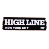 Black enamel pin with the High Line wordmark and "New York City NY" in white.