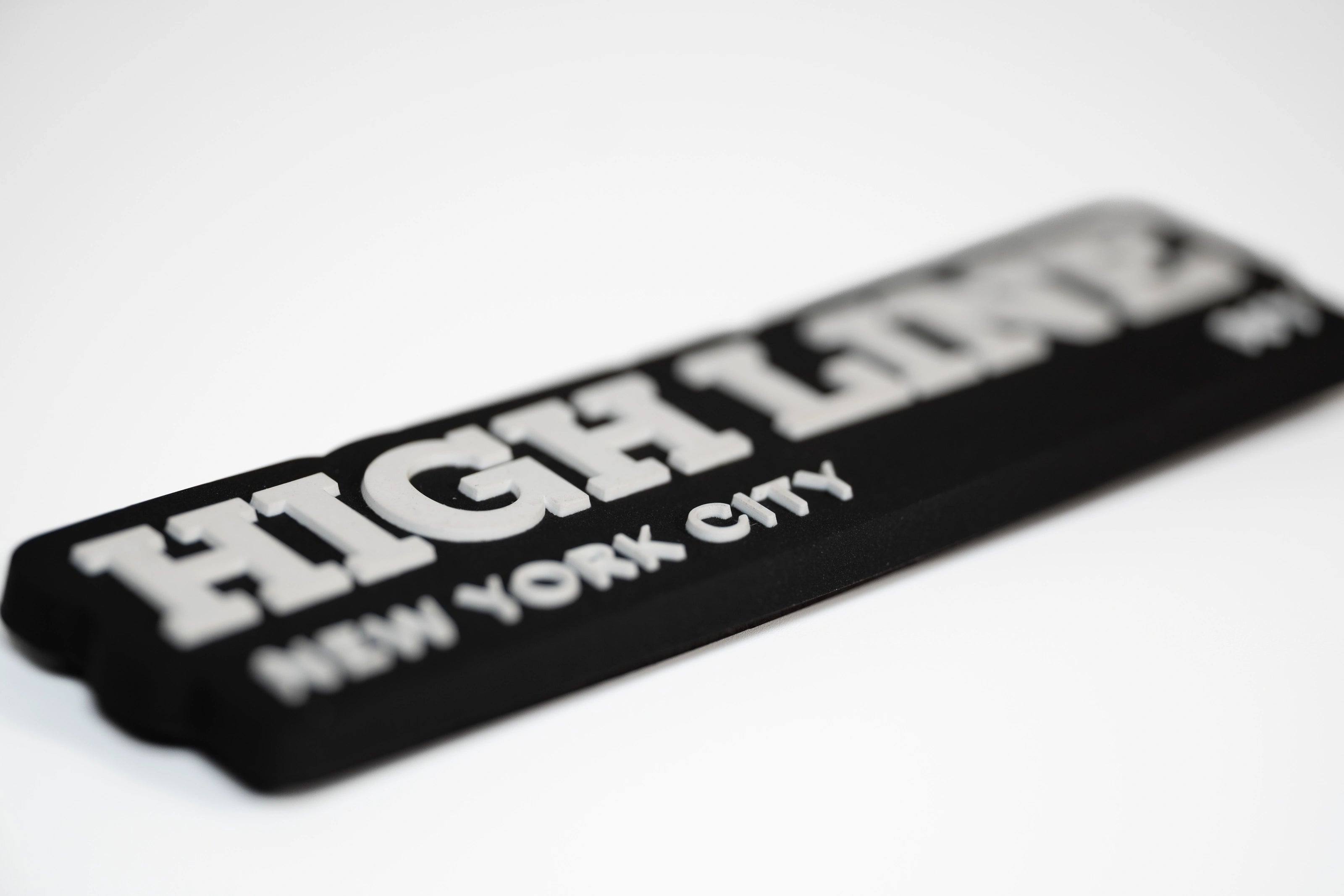 Rubber fridge magnet features the High Line's wordmark and "New York City NY" partially in focus.