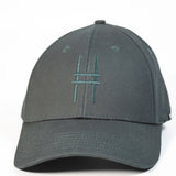 High Line Icon Cap—dark green cap with "Park in the sky" embroidered in matching text on the back.