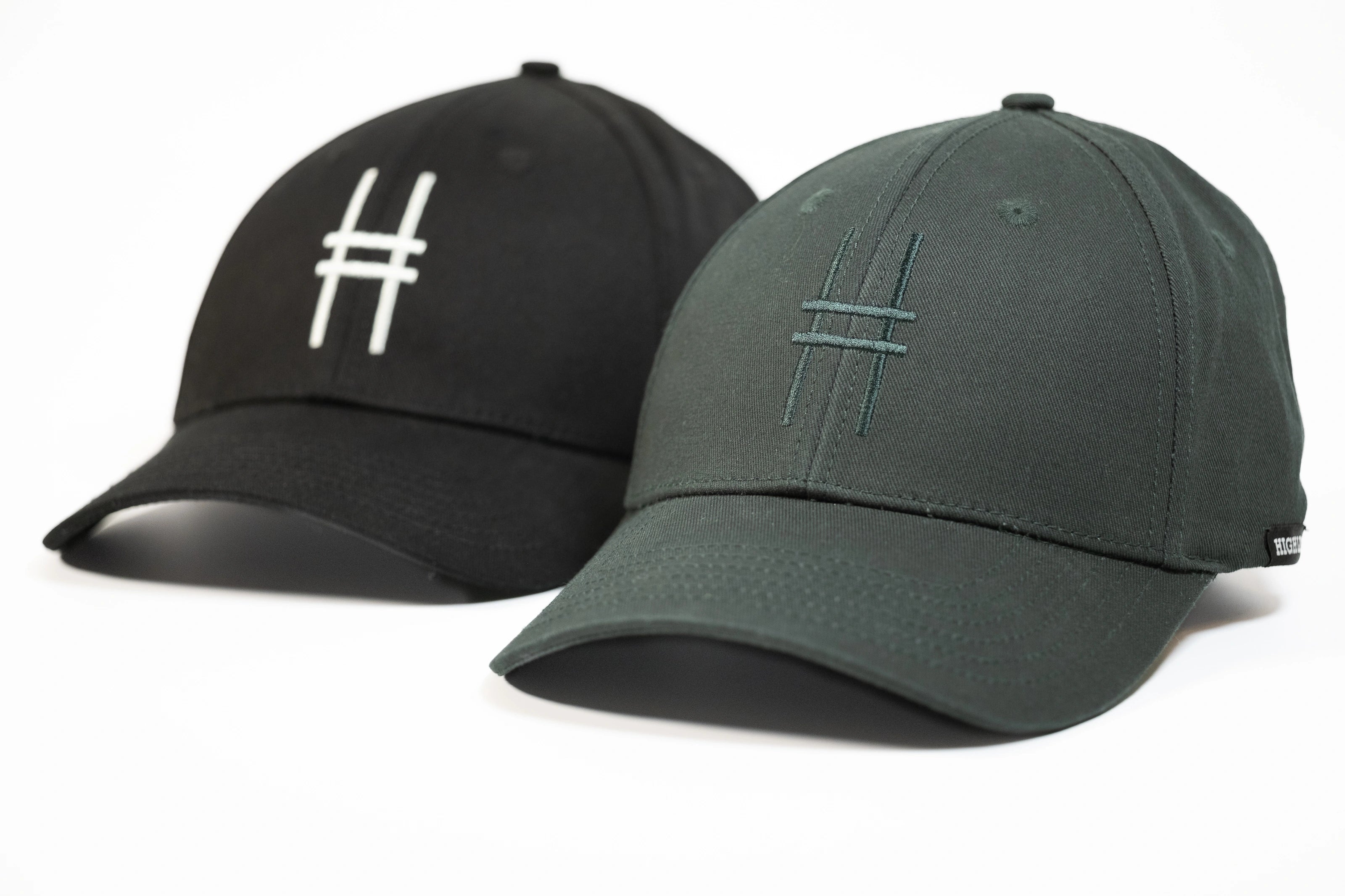Both High Line Icon Caps side by side.