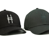 Both High Line Icon caps side by side.