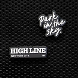 High Line Iconc collection rubber fridge magnets on a black metal locker. 