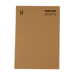 High Line soft cover unlined notebook in natural kraft with black cover details. Cover features High Line icon in upper left and High Line wordmark with tagline in the upper right.