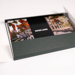 High Line Plinth Notecard Set with box open, cards and envelopes secured in a black "High Line" band.