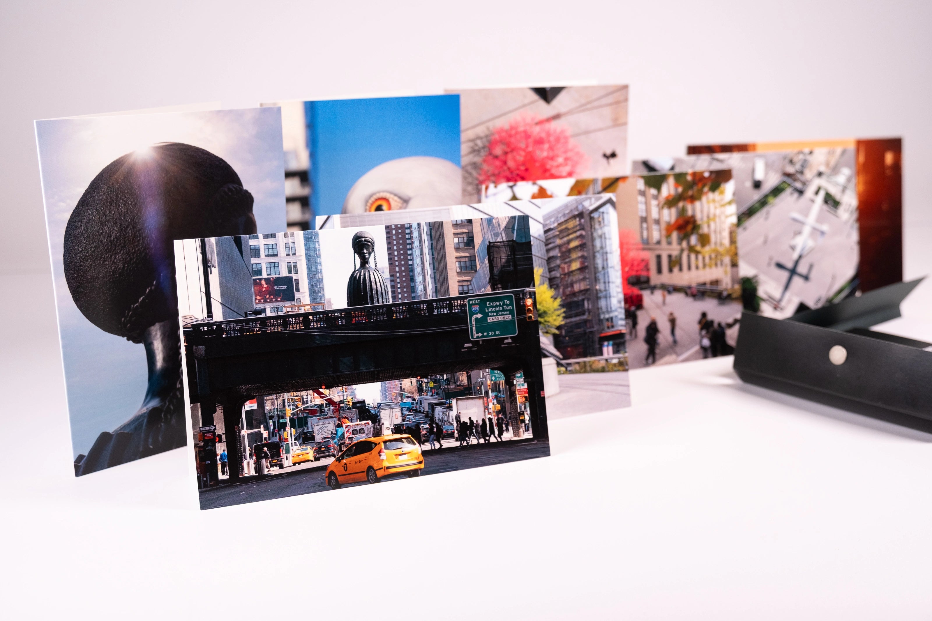 Each of the eight notecards in the HIgh Line Plinth set—each featuring a different photo, with two photos of each of the first four Plinth Commissions.