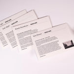 The backs of four of the eight notecards in the HIgh Line Plinth set—each featuring a different  Plinth Commission recipient and a bit about their statue.