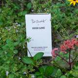 The Piet Oudolf x High Line Wildflower Field seed box by Hudson Valley Seed Co amidst the Wildflower Field on the High Line.