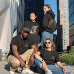 Four people, each wearing The Light That Shines... Hoodie or Tee, on the northern end of the High Line.