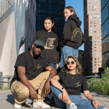 Four people, each wearing The Light That Shines... Hoodie or Tee, on the northern end of the High Line.