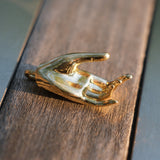 Varada mudra pendant in closeup.