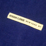 Closeup on High Line New York NY ribbon detail on the front of the Park in the Sky Crewneck Sweatshirt in navy.