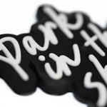 Detail shot of Park in the Sky rubber fridge magnet.