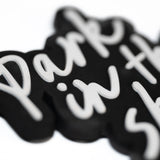 Detail shot of Park in the Sky rubber fridge magnet.