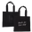 Both sides of the Park in the Sky Tote in Black—one side features the tagline "park in the sky" embroidered in white and the other the railroad track "H" icon embroidered in black against black canvas with black straps.