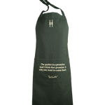 Piet Oudolf Quote Apron in dark green, featuring the High Line icon and the quote "The garden is a promise. And I think that promise is why you want to come back." in a pale yellow.