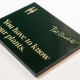 Acrylic fridge magnet featuring the quote "You have to know your plants" in pale yellow against dark green, with Piet Oudolf's signature and the High Line icon.