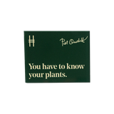 Acrylic fridge magnet featuring the quote "You have to know your plants" in pale yellow against dark green, with Piet Oudolf's signature and the High Line icon.