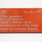 Acrylic fridge magnet featuring the quote "The garden is a promise. And I think that promise is why you want to come back." in pale blue against rich orange, with Piet Oudolf's signature and the High Line icon.