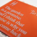 Acrylic fridge magnet featuring the quote "The garden is a promise. And I think that promise is why you want to come back." in pale blue against rich orange, with Piet Oudolf's signature and the High Line icon.