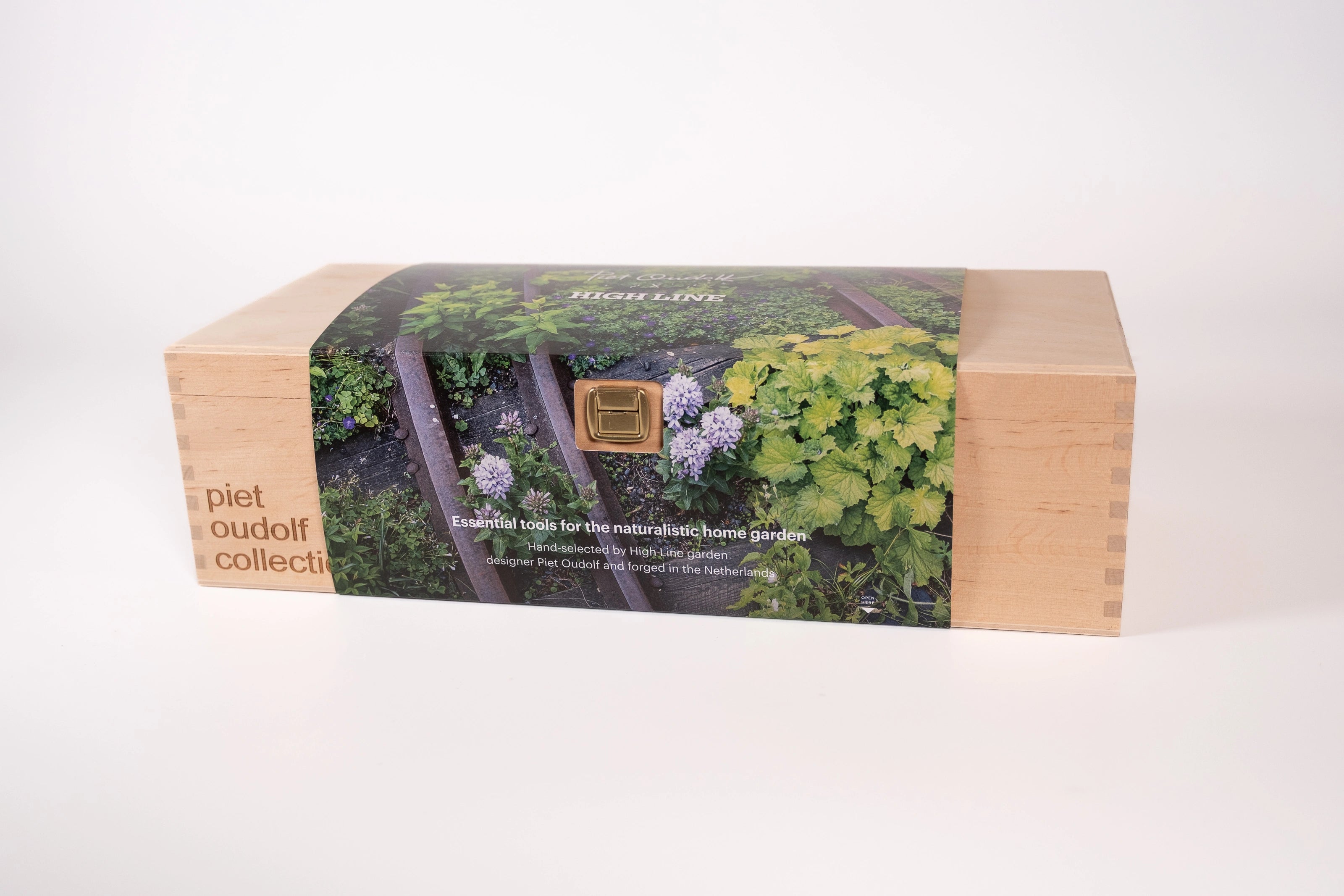 Tool box containing the City Gardener Essential Tool Kit, wrapped in an image of the High Line, with "piet oudolf collection" embossed on the box.