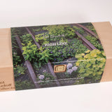 Tool box containing the City Gardener Essential Tool Kit, wrapped in an image of the High Line with "Piet Oudolf x High Line" overlaid on it. The box is embossed with "piet oudolf collection".