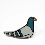 Sitting enamel pigeon pin.