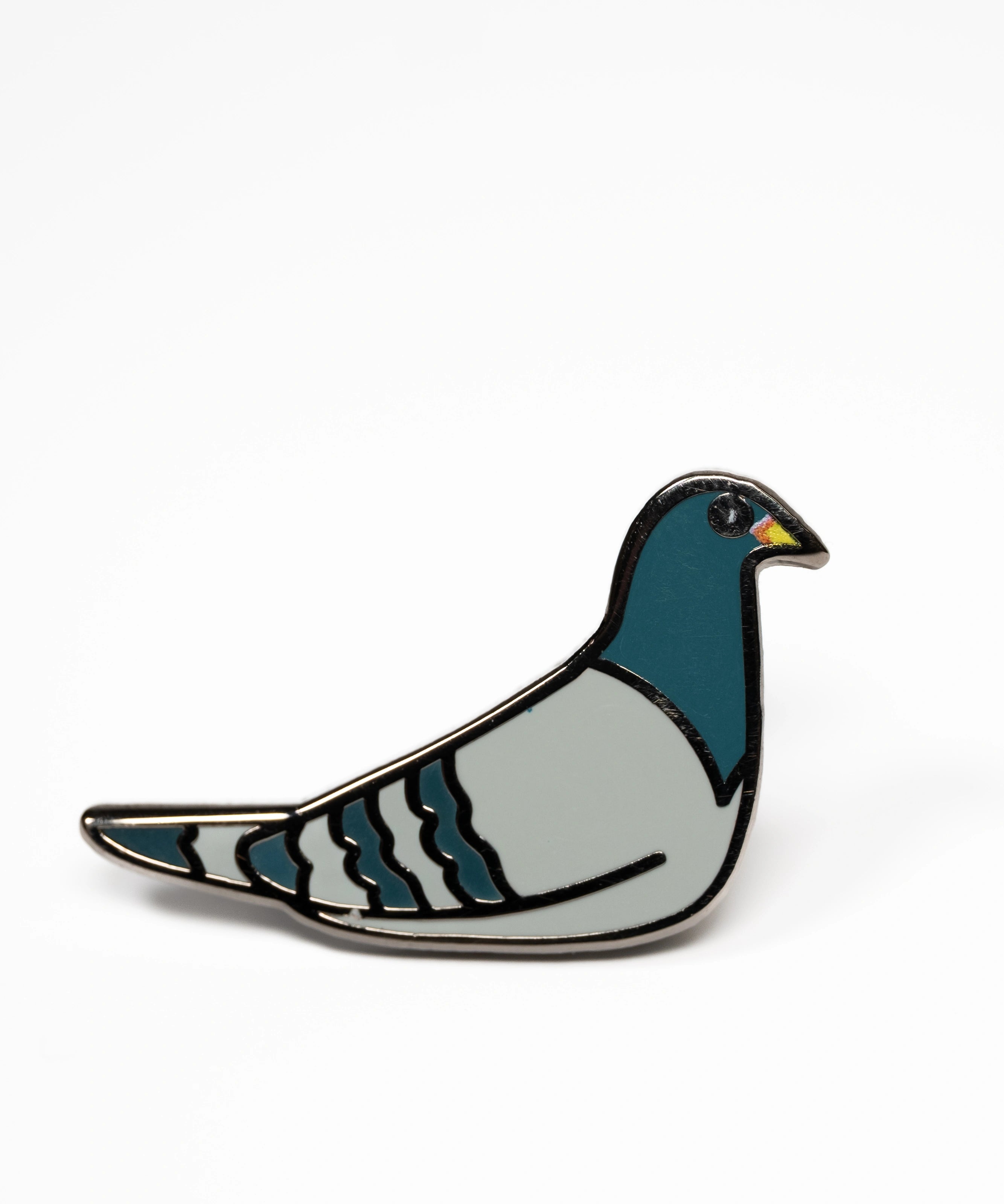Sitting enamel pigeon pin.