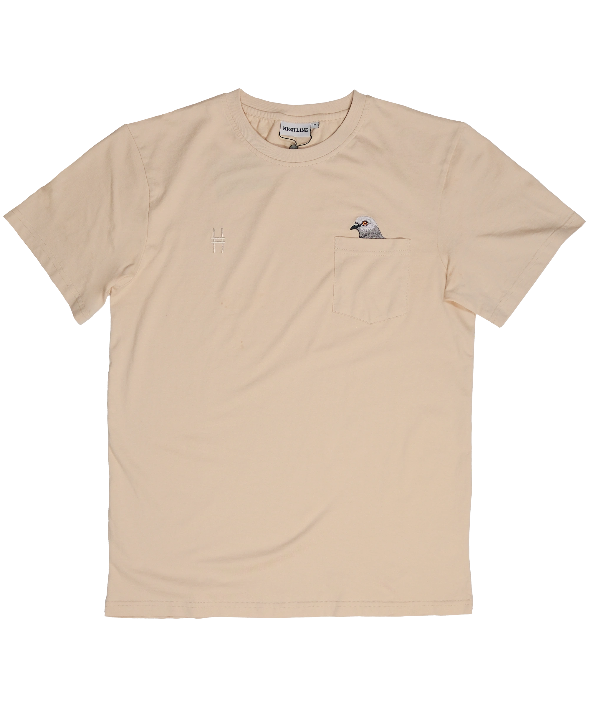 Pigeon Pocket tee—cream t-shirt with chest pocket featuring a small embroidered pigeon head poking out of it. On the other chest is a small High Line icon embroidered in monochromatic matching thread, laid flat.