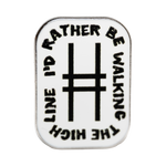 White enamel rectangular pin with rounded edges. At the center is the High Line icon, with the text "I'd rather be walking the High Line" wrapping around the border.