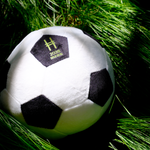 High Line Soccer Plush against grasses dappled in sunlight.